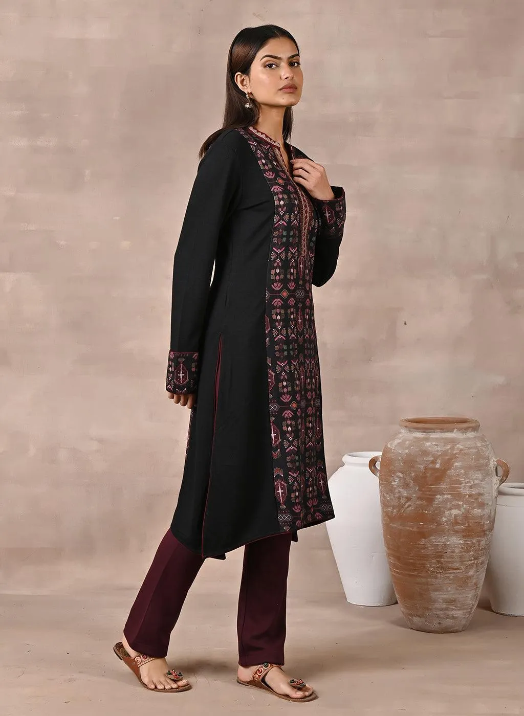 Black Solid Kurta with Tribal Embroidery and Curved Hem