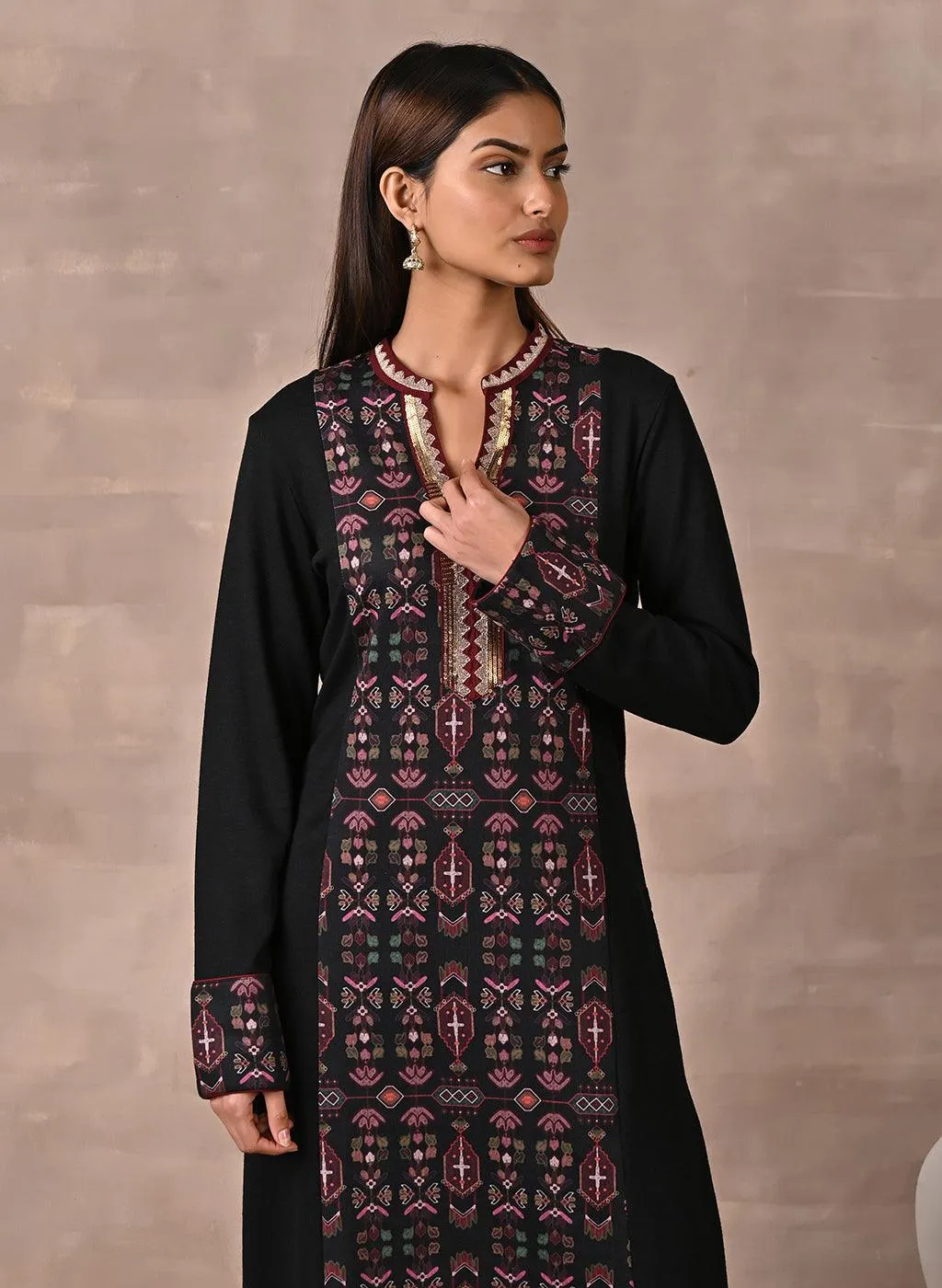 Black Solid Kurta with Tribal Embroidery and Curved Hem