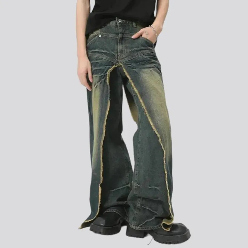 Distressed men's layered jeans