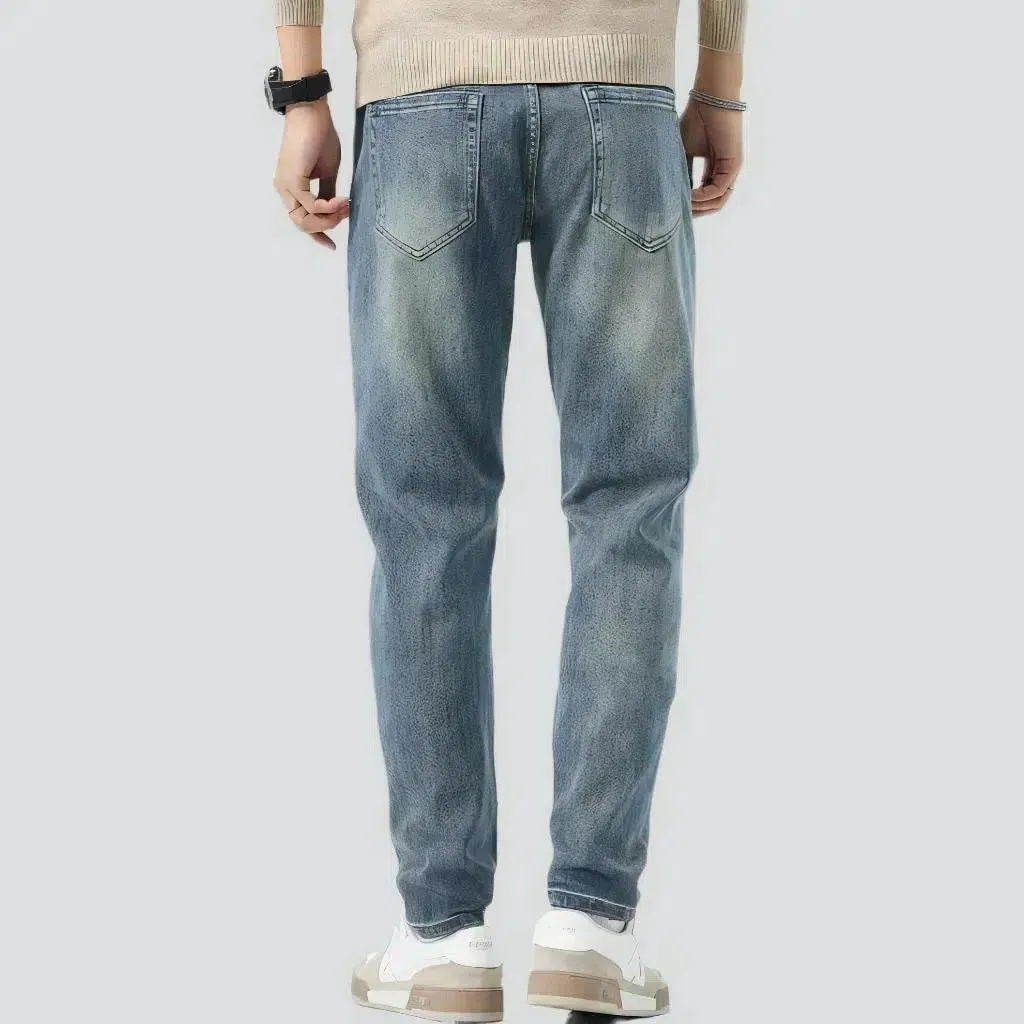 High-waist men's light-wash jeans