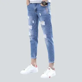 Light wash ripped men's jeans