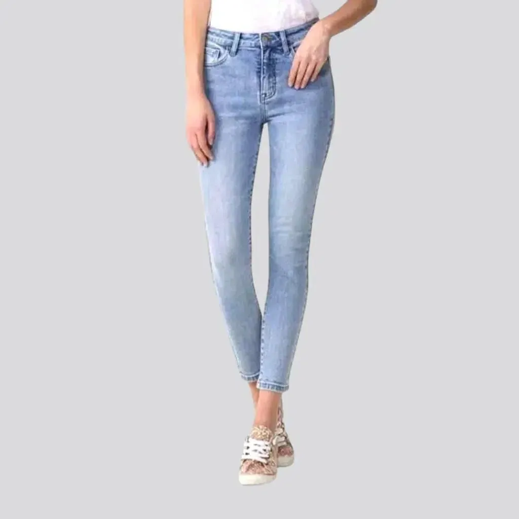 Light-wash whiskered jeans