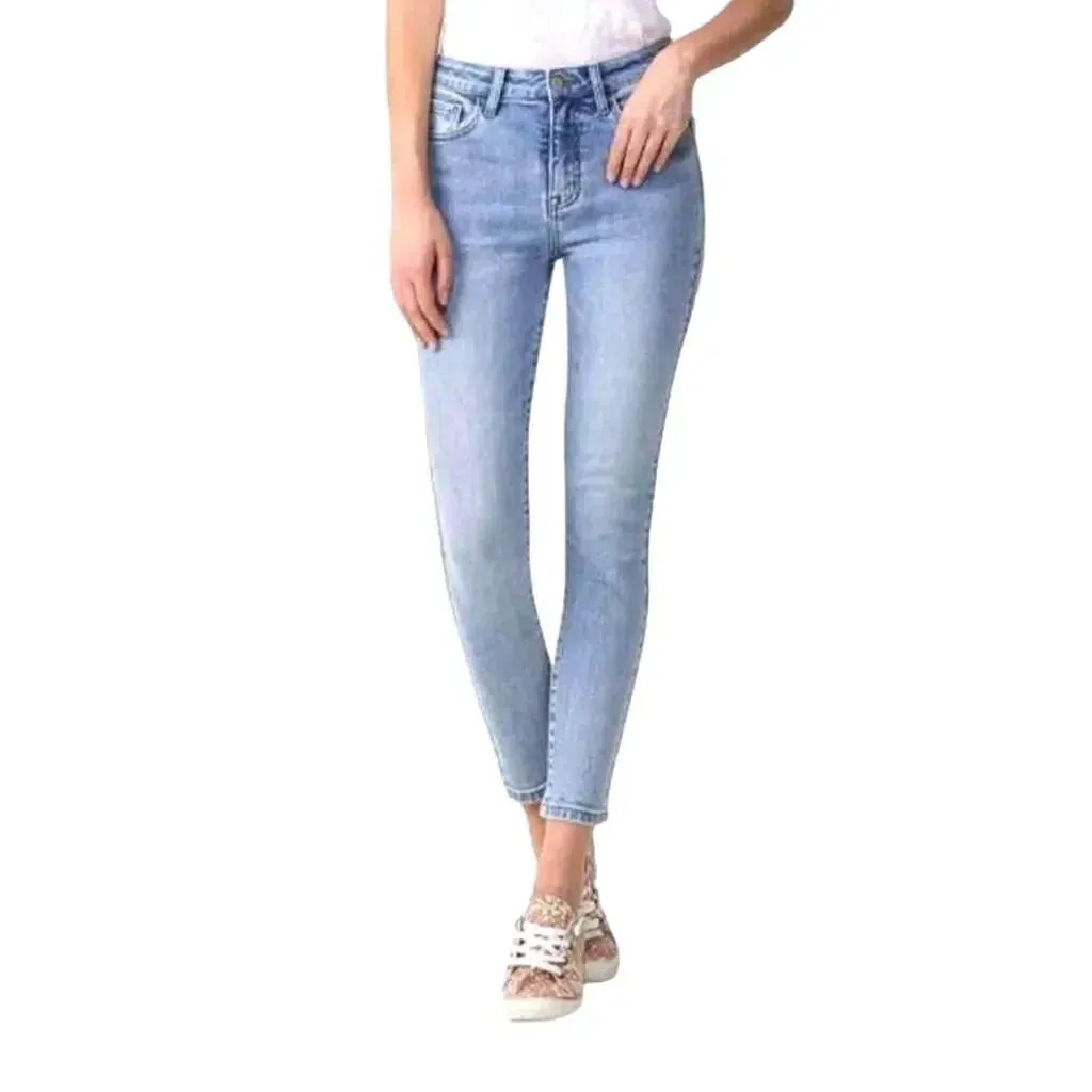 Light-wash whiskered jeans